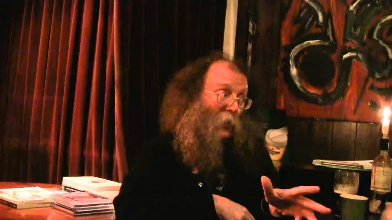Man with beard telling a story